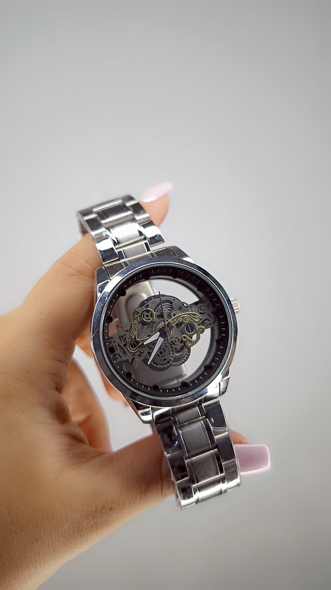 ساعت مردانه استیل با پشت قاب شیشه‌ای و قفل دکمه‌ای تاشو