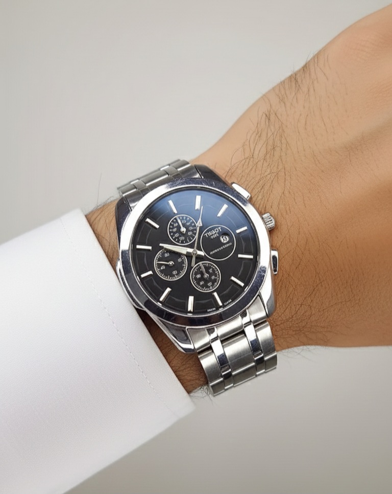 ساعت مردانه استیل کلاسیک — مدل تی‌سوت با صفحه مشکی و نمایش تاریخ